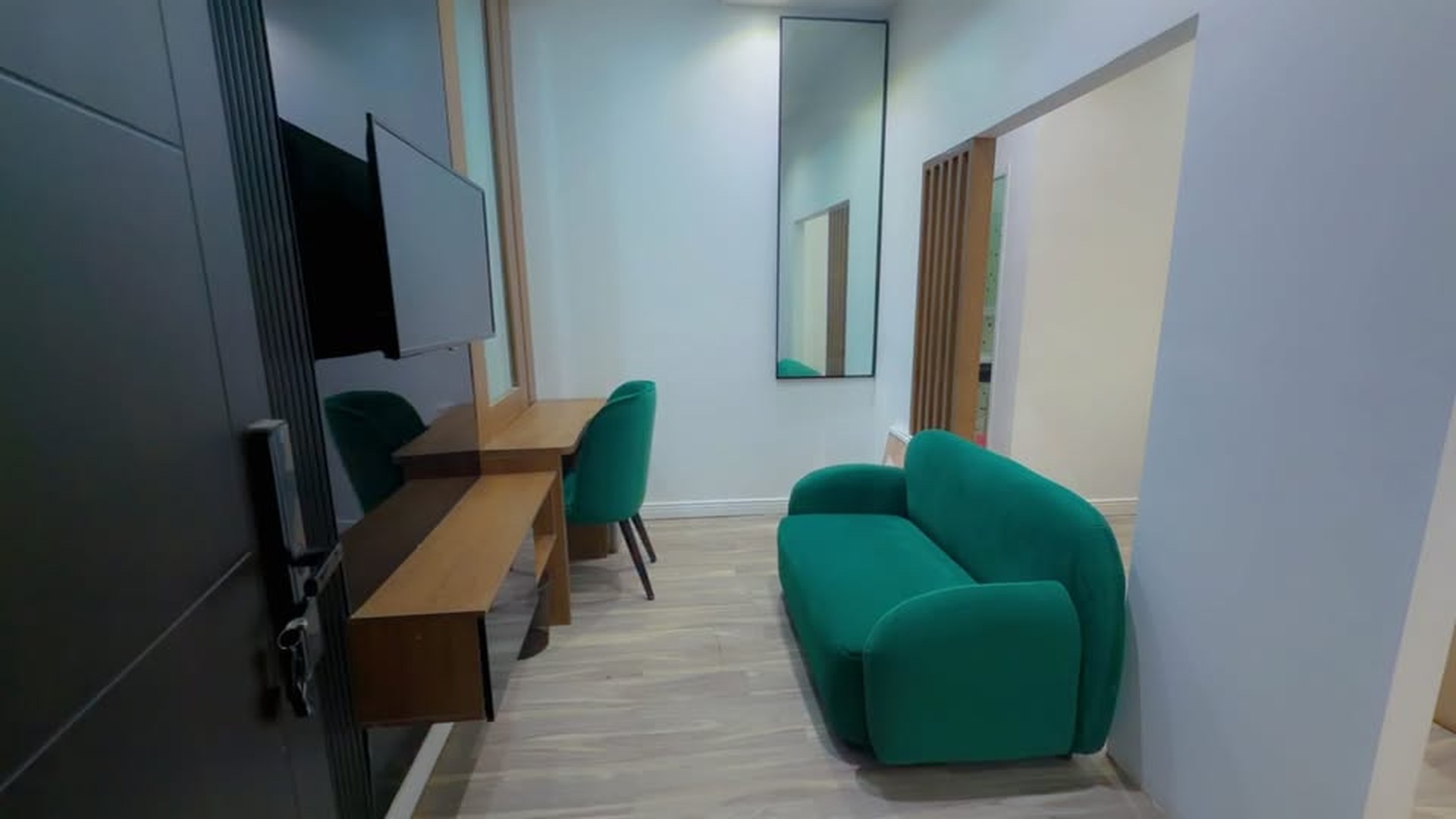 Super Deluxe Mini emerald velvet lounge chairs